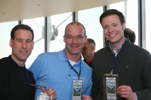 2011 VIP Guests holding up their Super Bowl XLV Tickets  